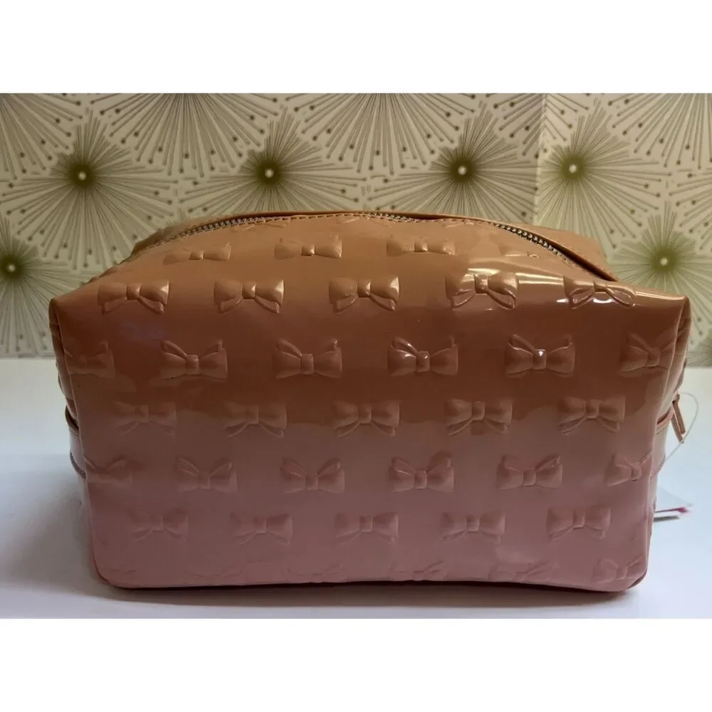 Betsey Johnson embossed patent travel/cosmetic bag in blush pink. NWT.